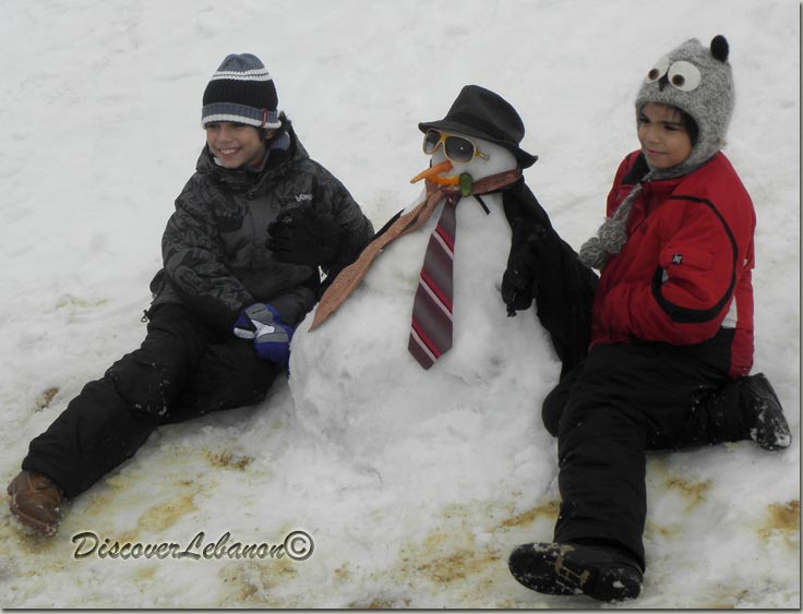Snowman and boys