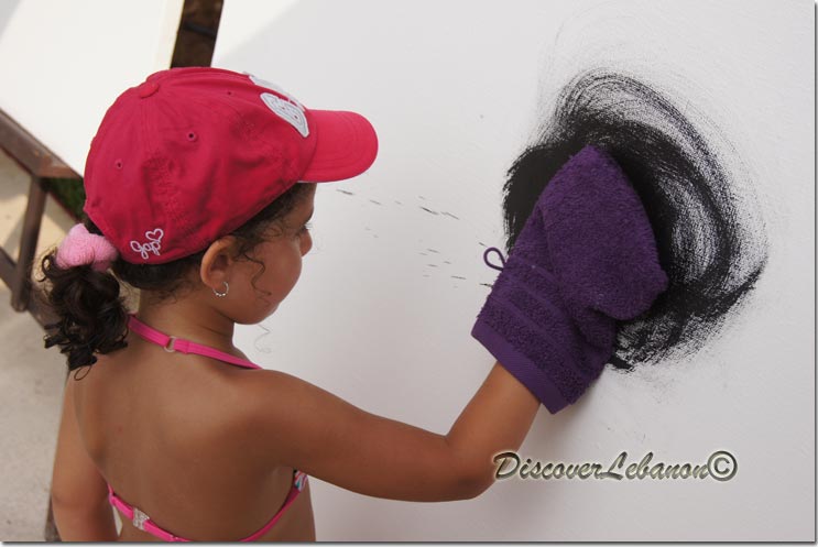 Little girl painting